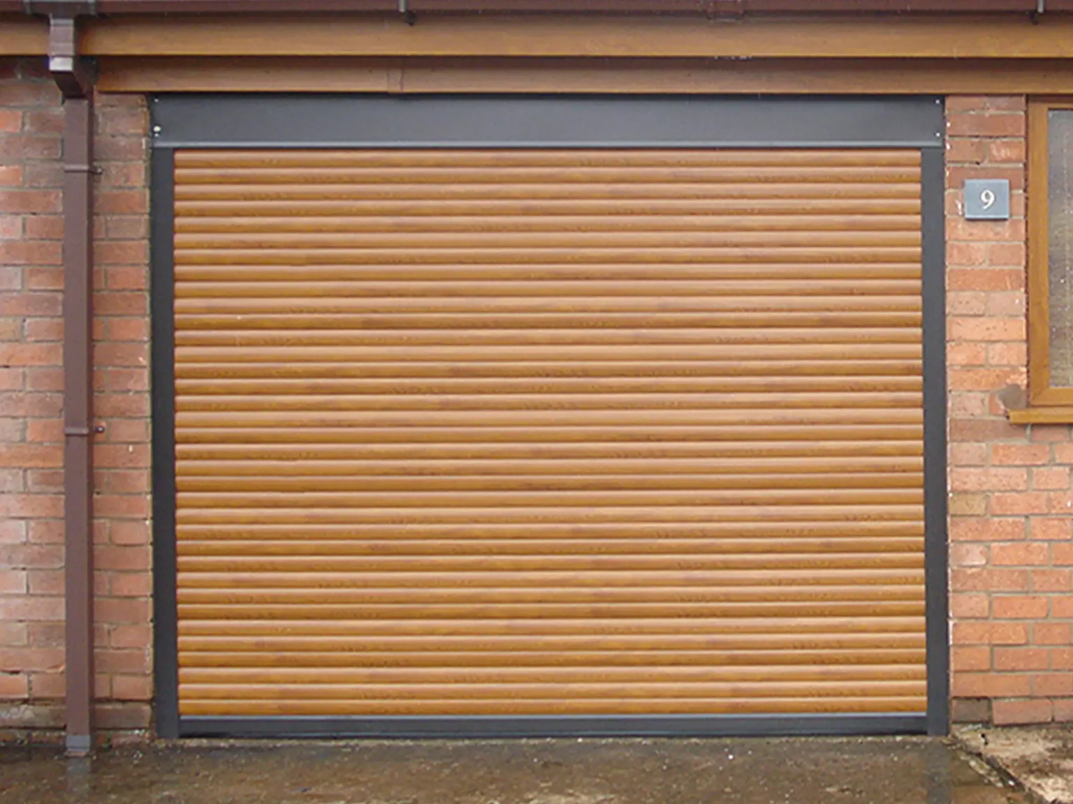 Europa Insulated Roller Garage Door Gallery Image Golden Oak Contrasting Frame and Box