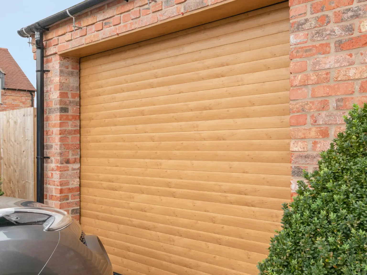 Europa Insulated Roller Garage Doors Gallery Image Irish Oak​ Textured