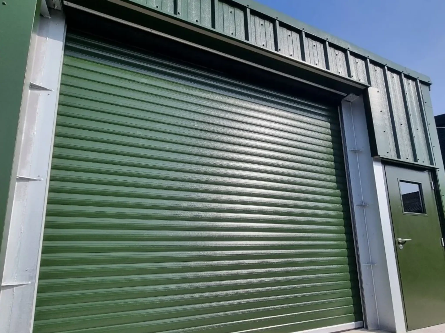 Ganymede Insulated shutters in HPS200 Plastisol Juniper Green