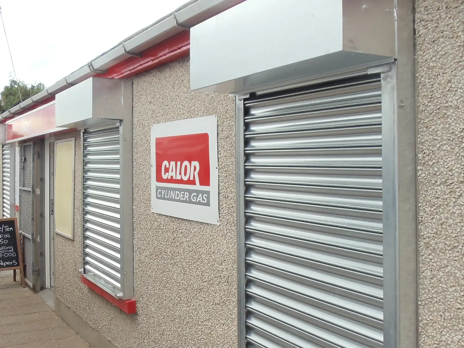 High security to a post office with push up shutters to the windows